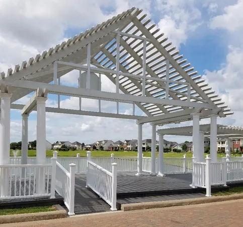 a view of swimming pool with outdoor seating and a yard