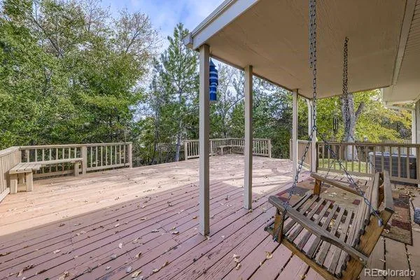a view of a chairs and table on the wooden floor