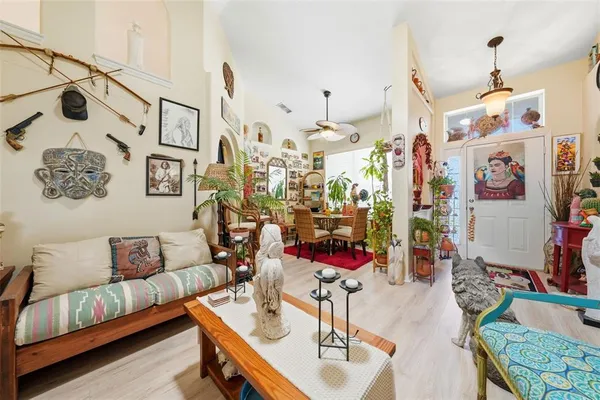 a living room with lots of furniture and couch