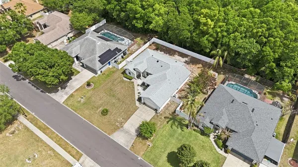 aerial view of a house with outdoor space