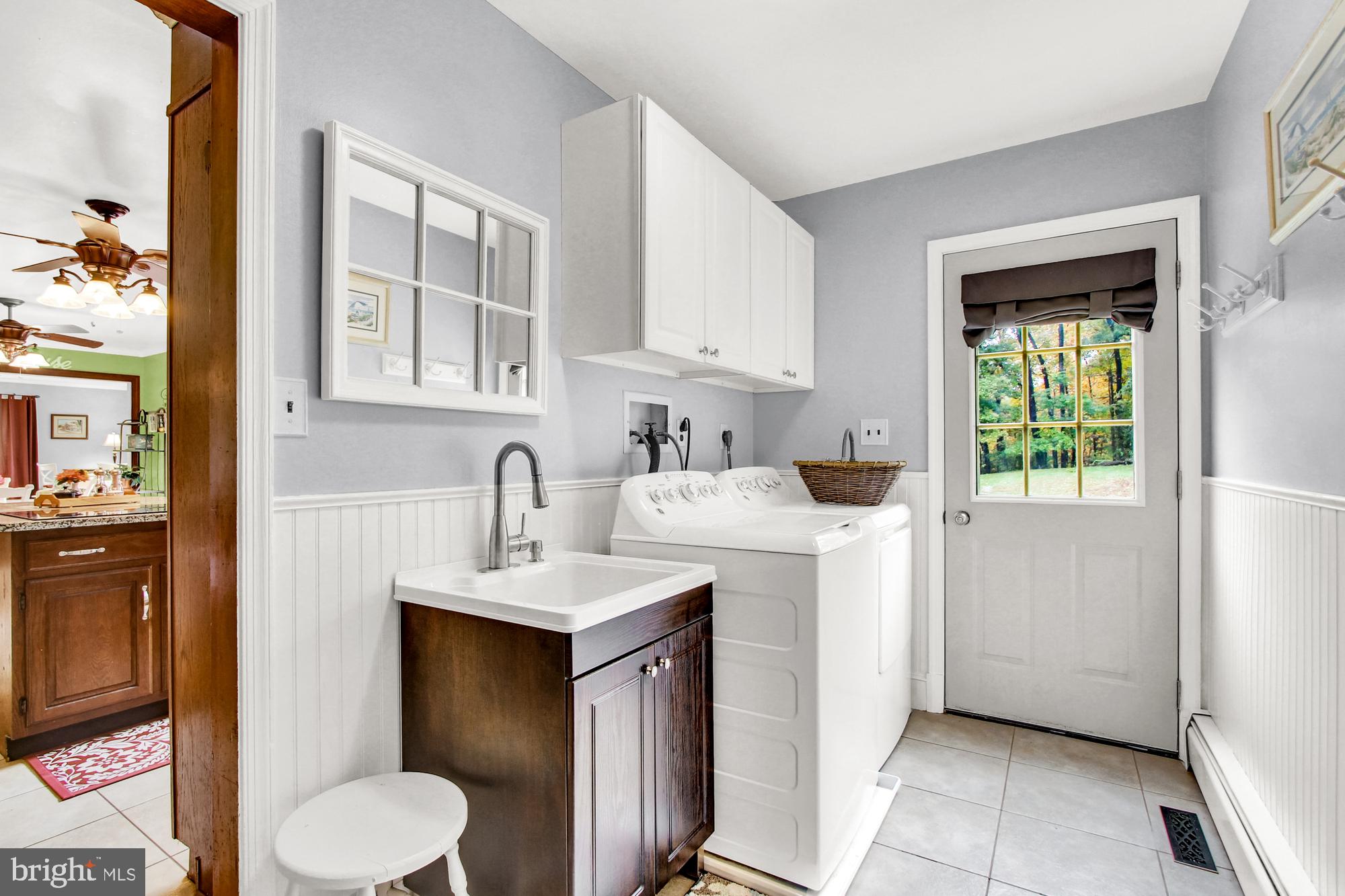 18902 Vernon Road White Hall, MD 21161 - Photo 19 of 69 The mudroom/laundry is great for country living!