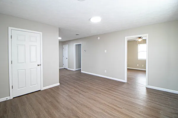 a view of a livingroom with wooden floor