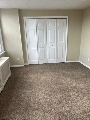 an empty room with closet