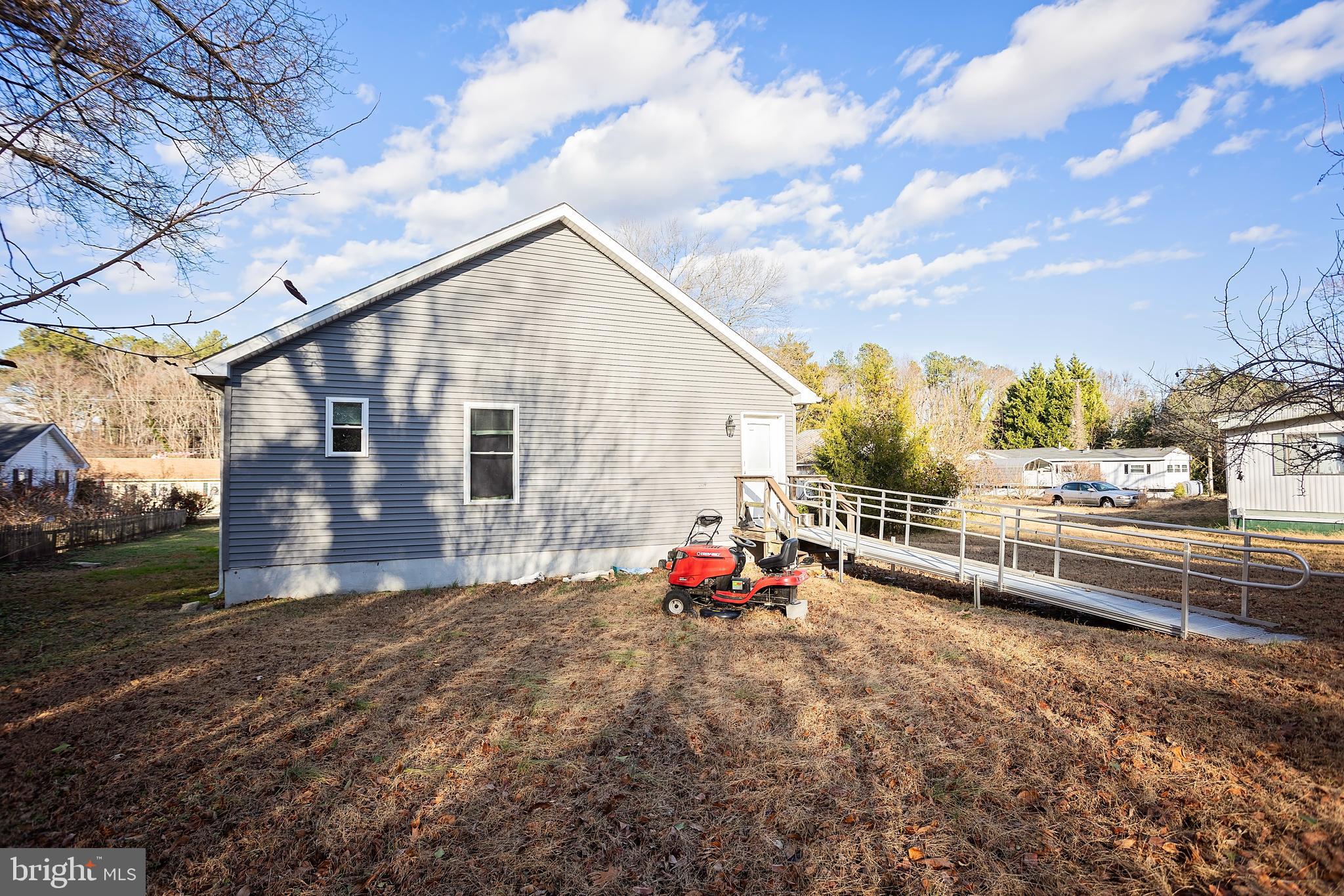 128 South Street Secretary, MD 21664 - Photo 12 of 14 a view of a house with a patio