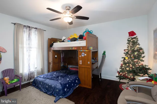 a bed room with furniture and a window
