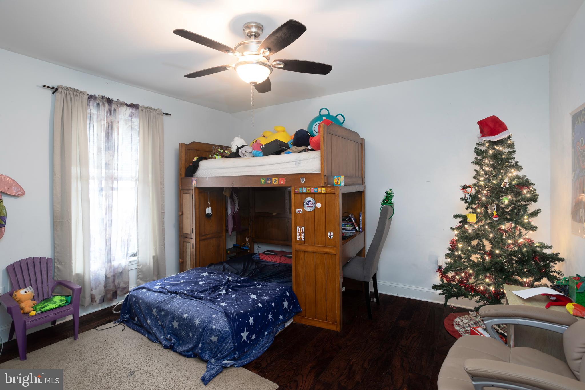 128 South Street Secretary, MD 21664 - Photo 10 of 14 a bed room with furniture and a window