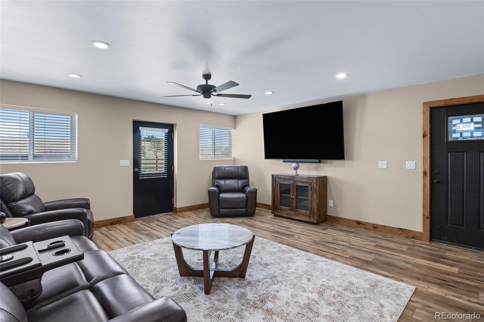 31980 Highway 24 Simla, CO 80835 - Photo 14 of 20 a living room with furniture and a flat screen tv