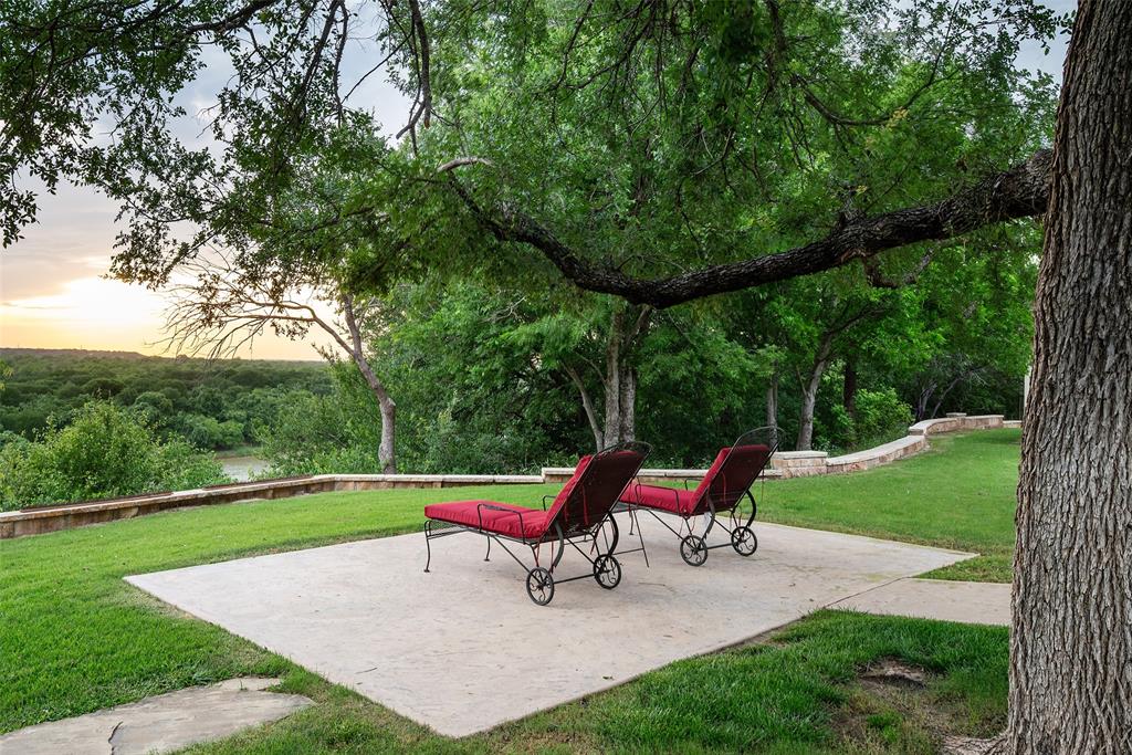 2312 Cactus Rio Lane Weatherford, TX 76087 - Photo 37 of 37 a bench sitting in the middle of a park