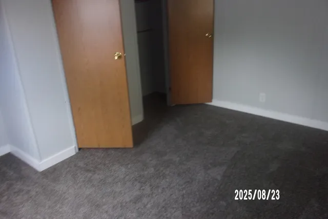 an empty room with a door