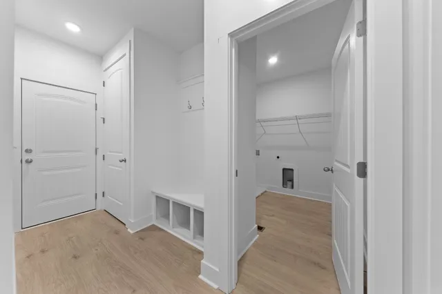 an aerial view of a house with a yard basket ball court and outdoor seating