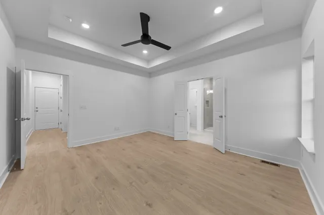 a view of a swimming pool with a yard and outdoor seating