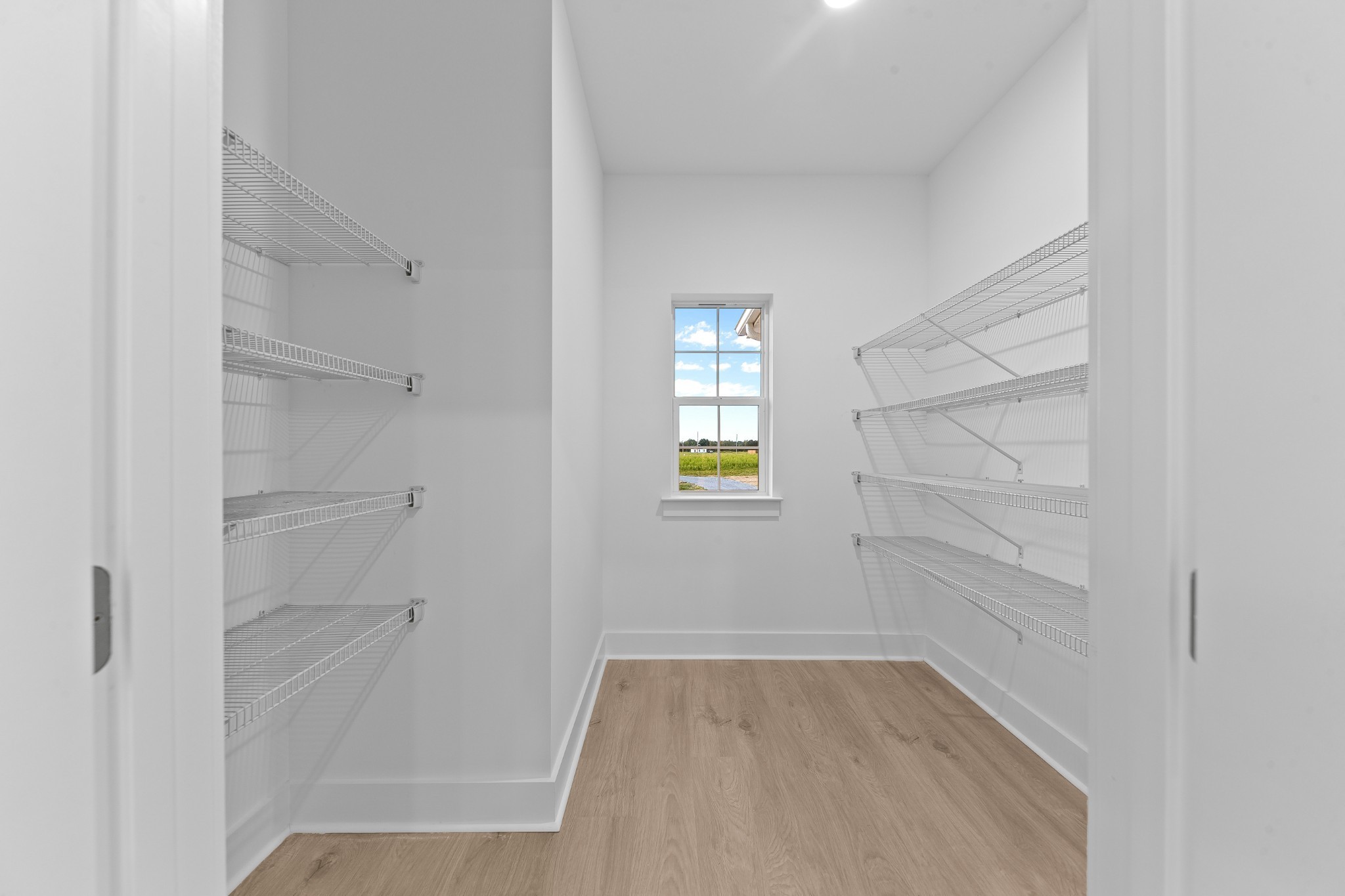 232 Dugout Road Summertown, TN 38483 - Photo 48 of 70 a view of walk in closet with empty racks