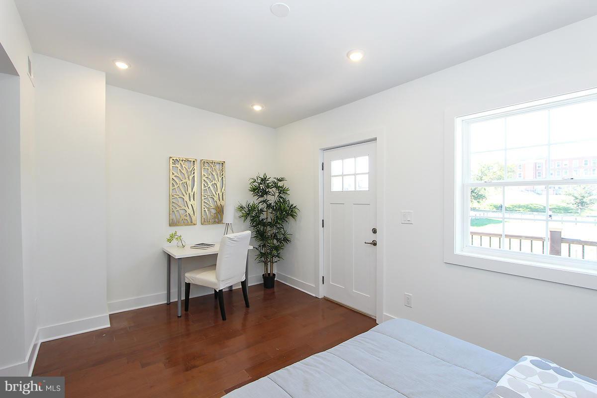 222 20th Street Northeast, Unit 1 Washington, DC 20002 - Photo 13 of 22 a workspace with furniture and window