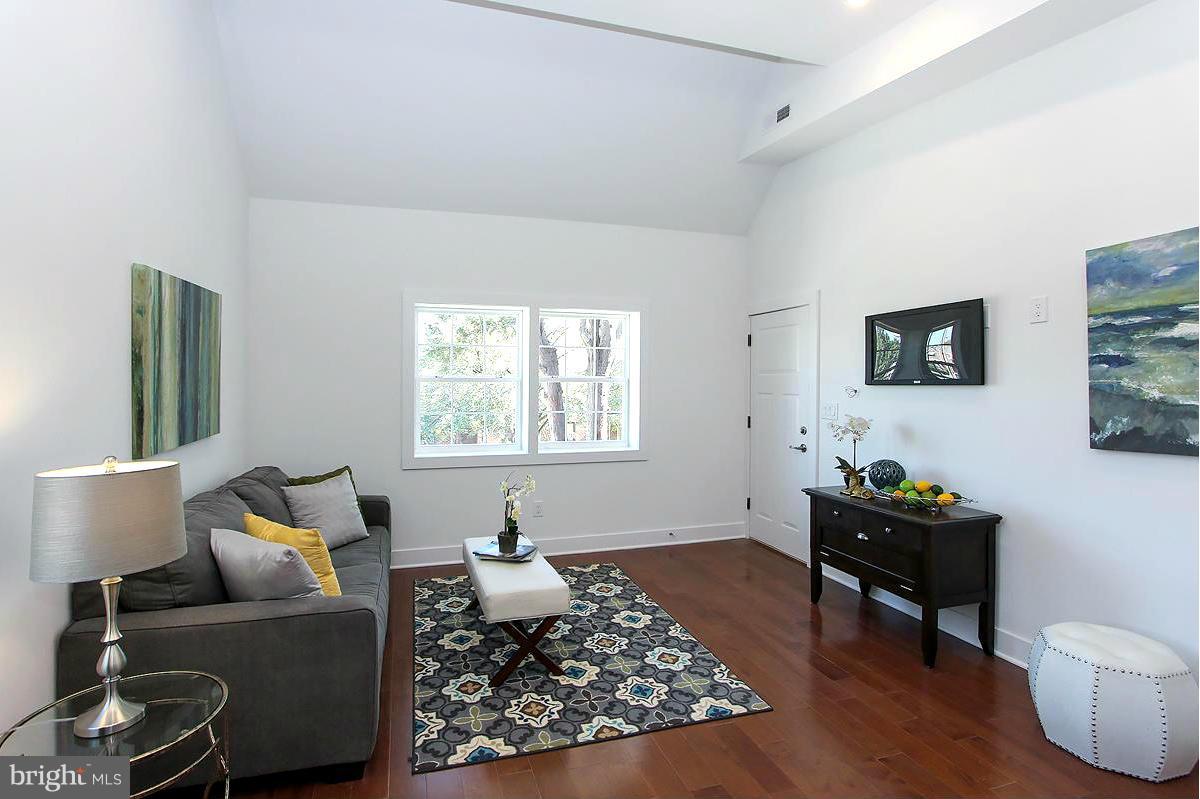 222 20th Street Northeast, Unit 1 Washington, DC 20002 - Photo 3 of 22 a living room with furniture and a window