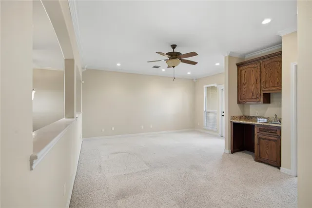 a bathroom with a sink a mirror and vanity