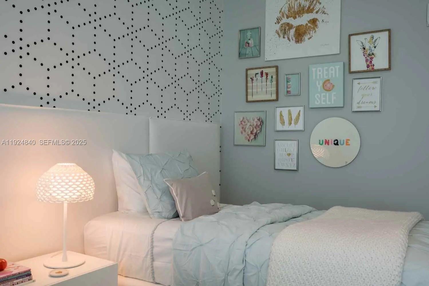 Surfside Surfside, FL 33154 - Photo 11 of 36 a bedroom with a bed and a wall painting