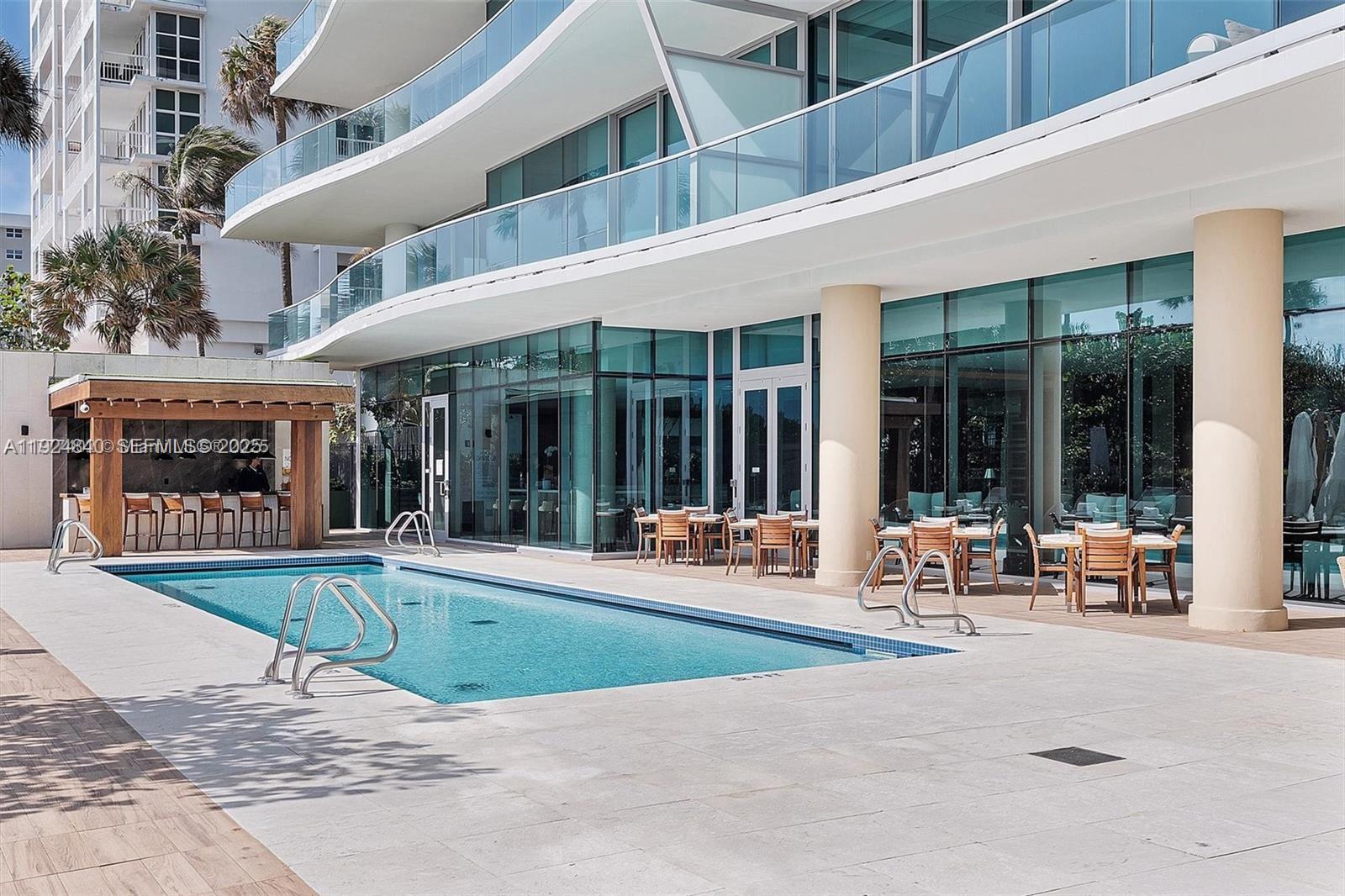 Surfside Surfside, FL 33154 - Photo 22 of 36 a view of a building with sitting area