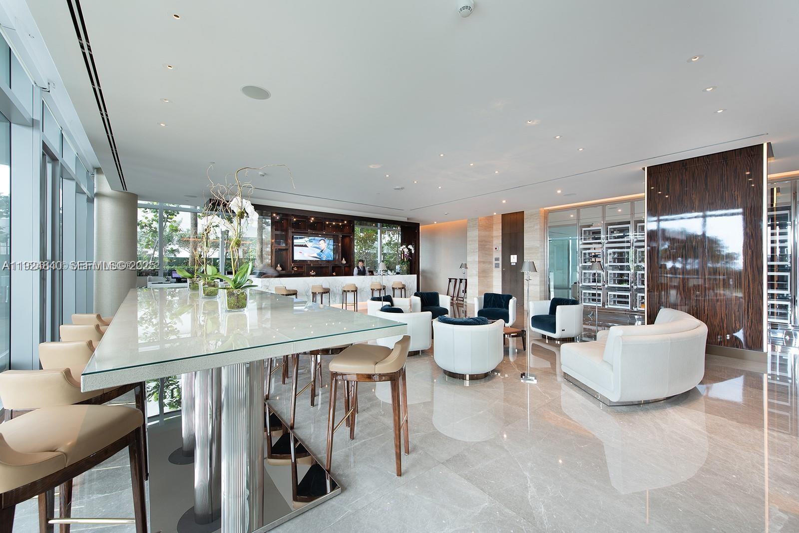 Surfside Surfside, FL 33154 - Photo 26 of 36 a very nice looking living room with a large window and dining table