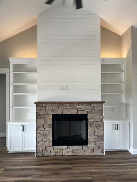 8246 Aedc Road Estill Springs, TN 37330 - Photo 53 of 55 a living room with a fireplace and a wooden floor