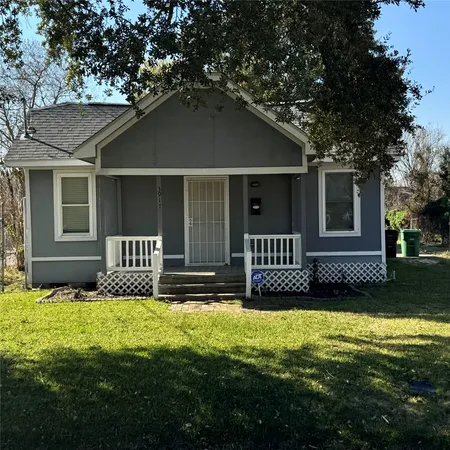 a house view with a garden space