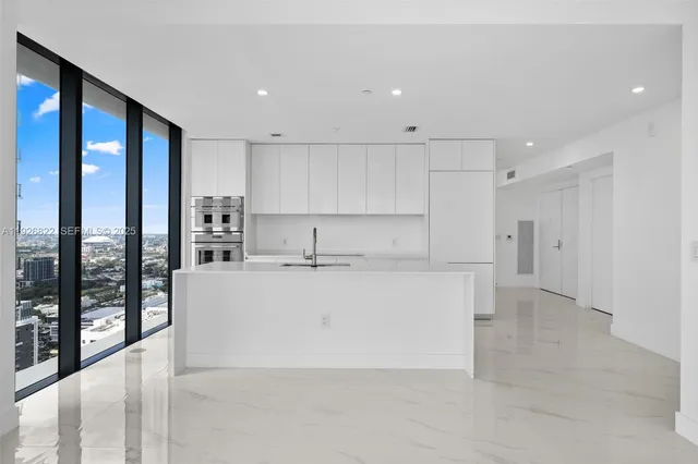 a view of balcony with furniture