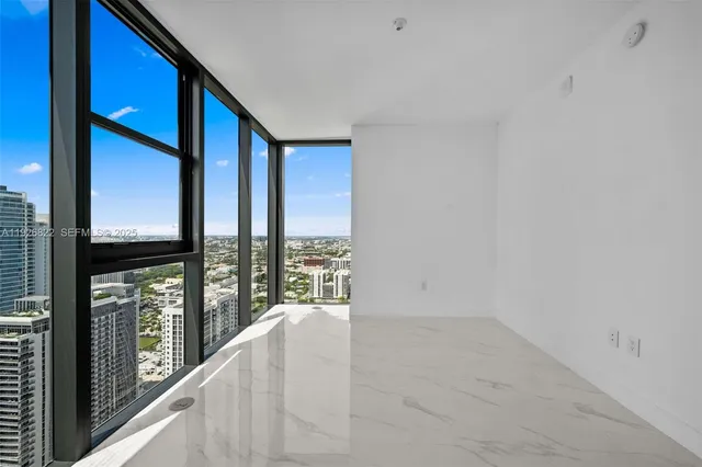 a view of a city with tall buildings