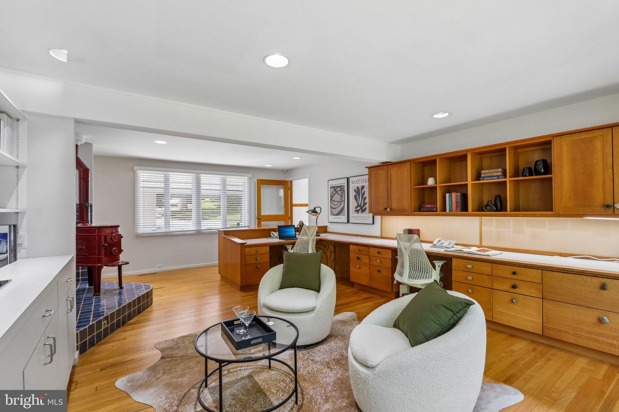 1673 Paper Mill Road Jenkintown, PA 19046 - Photo 25 of 73 a living room with furniture a rug and a large window