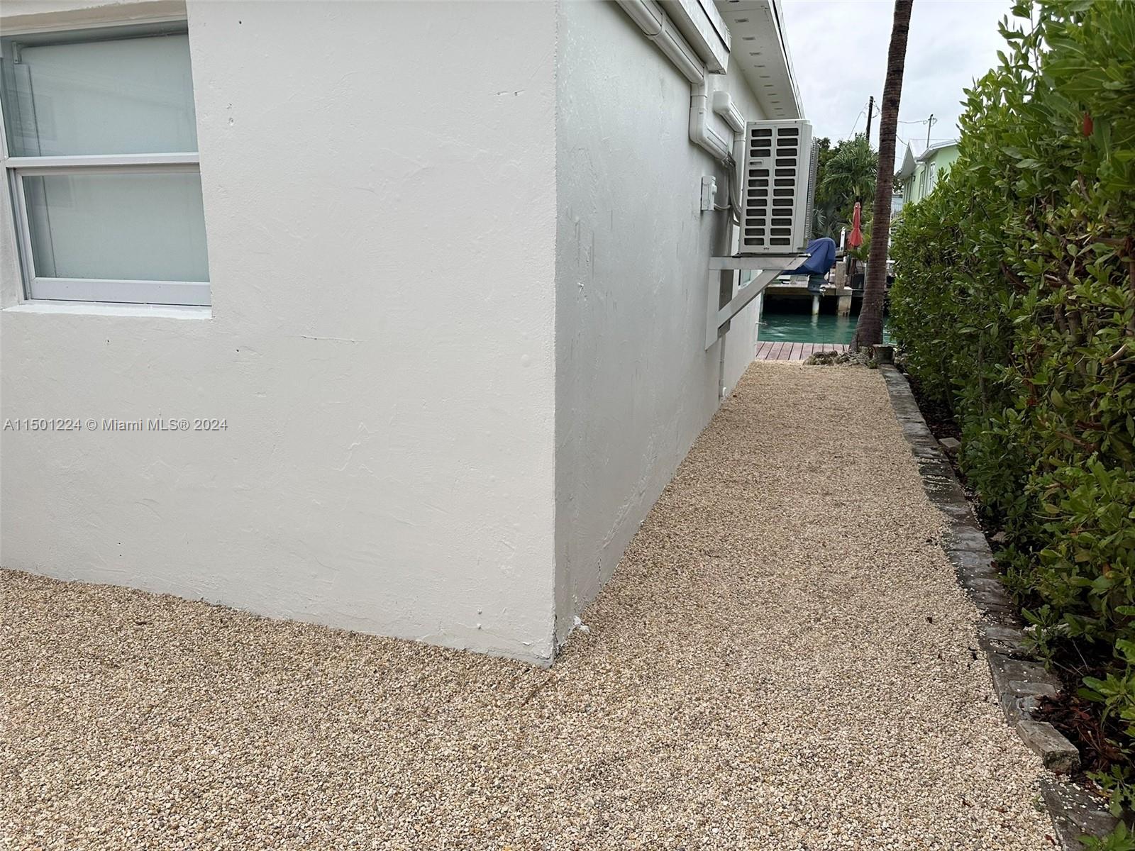 11326 5th Avenue Ocean Marathon, FL 33050 - Photo 25 of 27 a view of a backyard with pathway