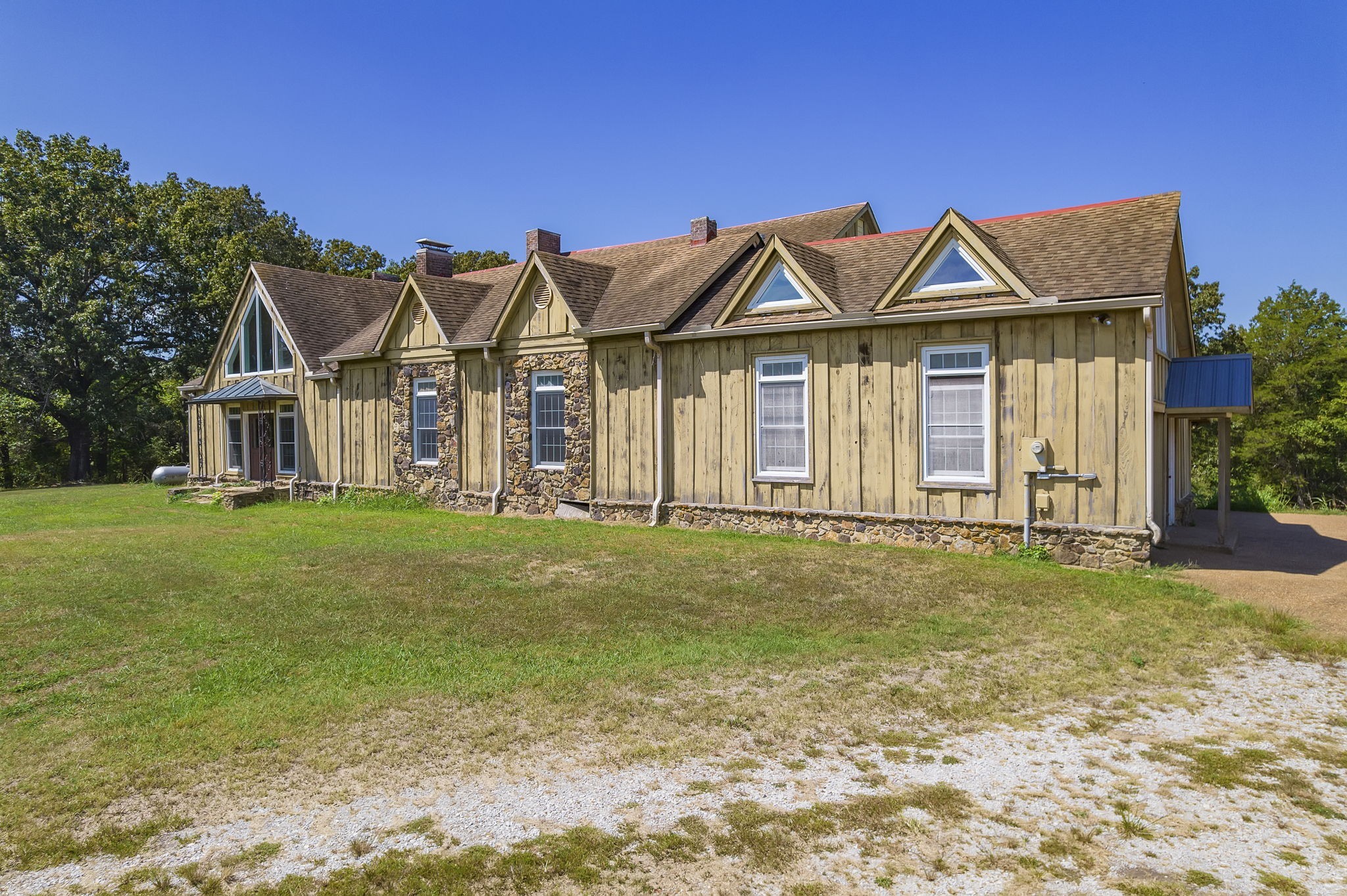 290 Leeford Lane Cedar Grove, TN 38321 - Photo 17 of 54 a front view of a house with garden