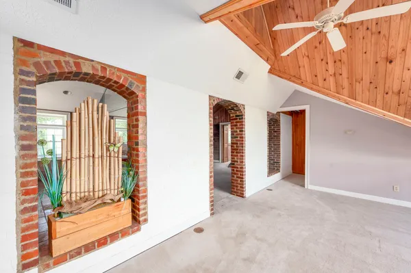 a kitchen with stainless steel appliances granite countertop a stove and a refrigerator