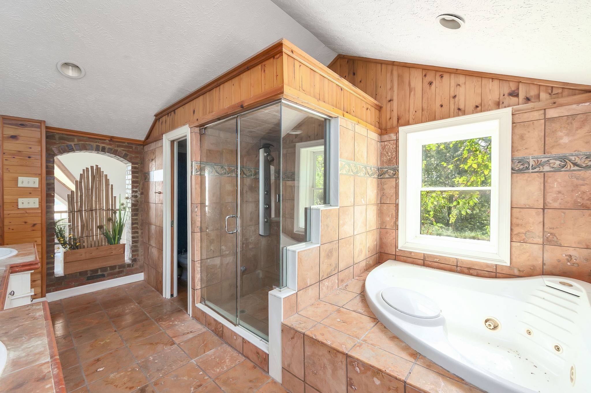 290 Leeford Lane Cedar Grove, TN 38321 - Photo 34 of 54 a bathroom with a bathtub and a shower