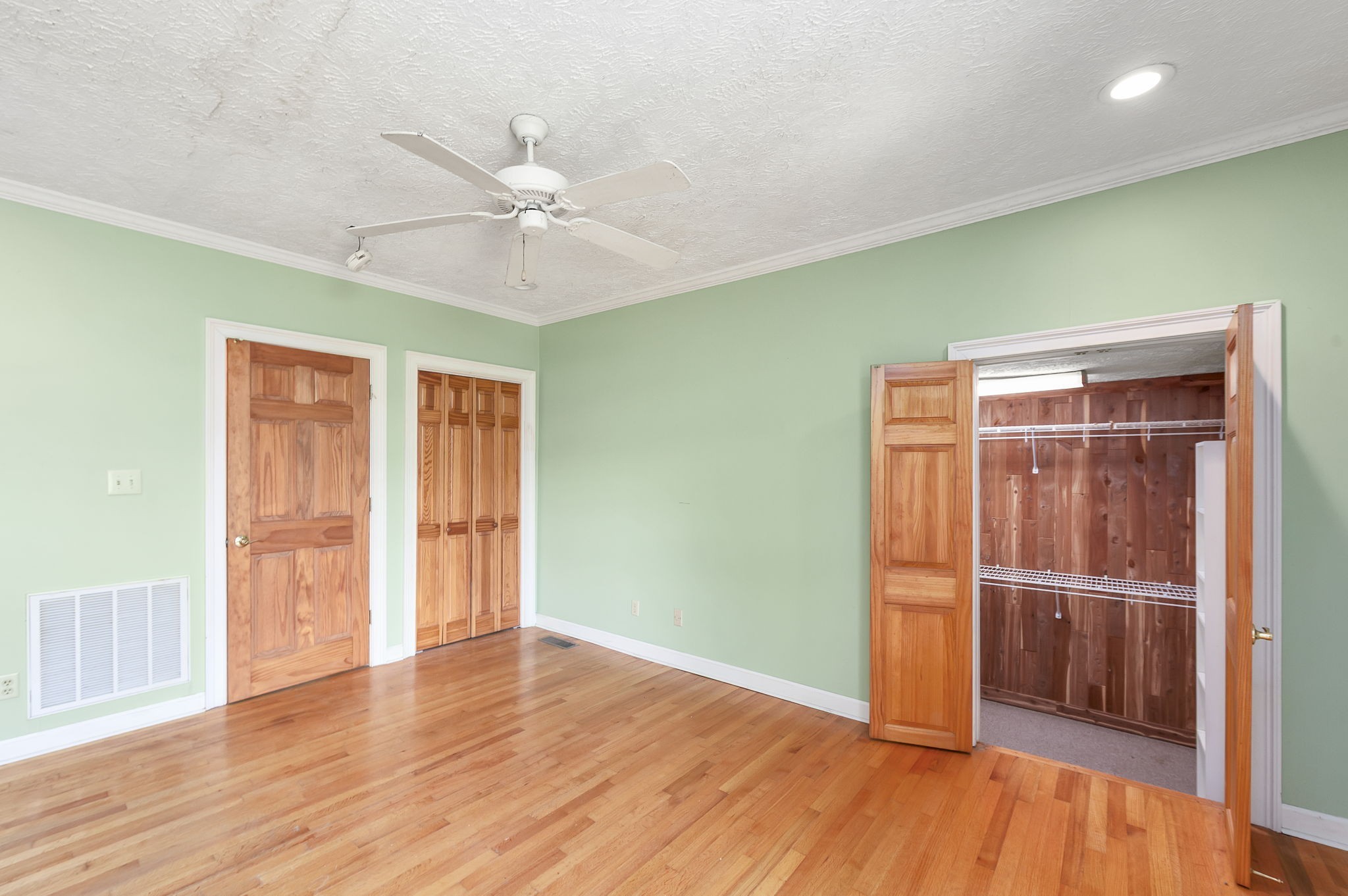 290 Leeford Lane Cedar Grove, TN 38321 - Photo 36 of 54 a view of empty room with wooden floor and fan