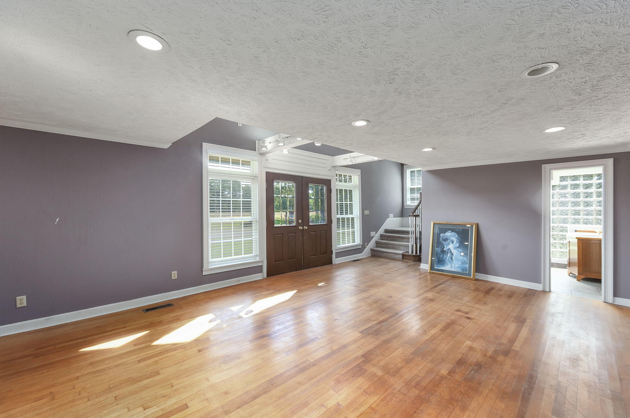 290 Leeford Lane Cedar Grove, TN 38321 - Photo 43 of 54 a view of an empty room with window and wooden floor