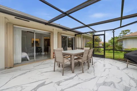 $475,000 | 103 Villa Circle, Atlantis, FL 33462