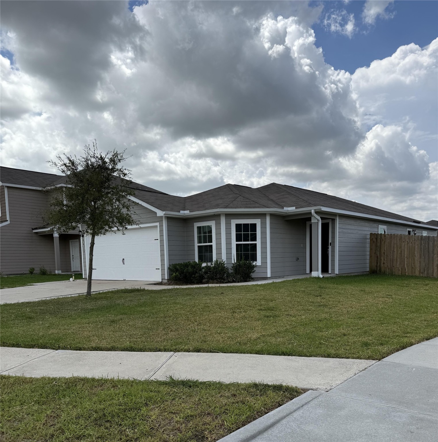 8419 Hannah Rd Cove Cove, TX 77523 - Photo 1 of 21 a front view of a house with a garden