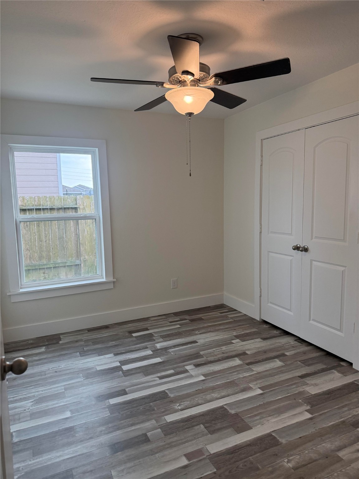 8419 Hannah Rd Cove Cove, TX 77523 - Photo 6 of 21 a view of room with window and ceiling fan