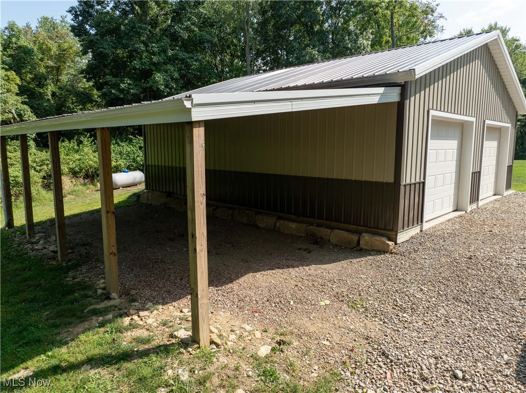 2371 Tabor Ridge Road Northeast New Philadelphia, OH 44663 - Photo 10 of 43 View of garage lean-to
