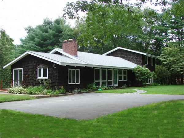 409 Ipswich Road Boxford, MA 01921 - Photo 1 of 20 a front view of a house with garden