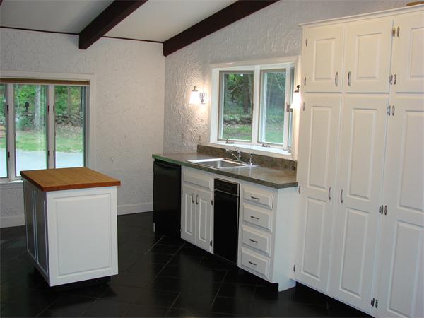 409 Ipswich Road Boxford, MA 01921 - Photo 4 of 20 a kitchen that has a sink and a stove