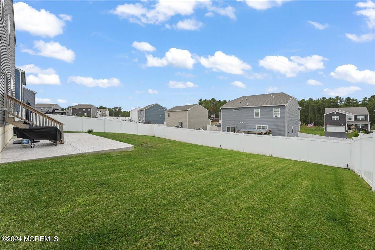 137 Cox Road Barnegat, NJ 08005 - Photo 38 of 40 a view of a garden with houses