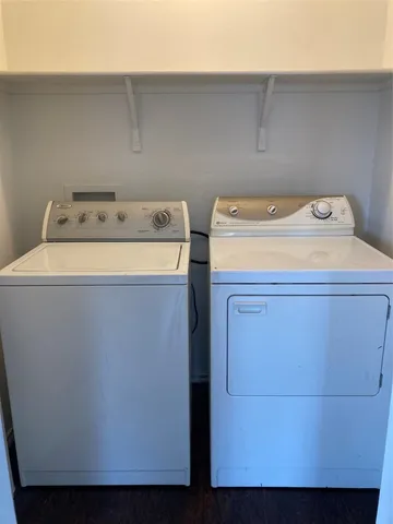 a utility room with dryer and washer
