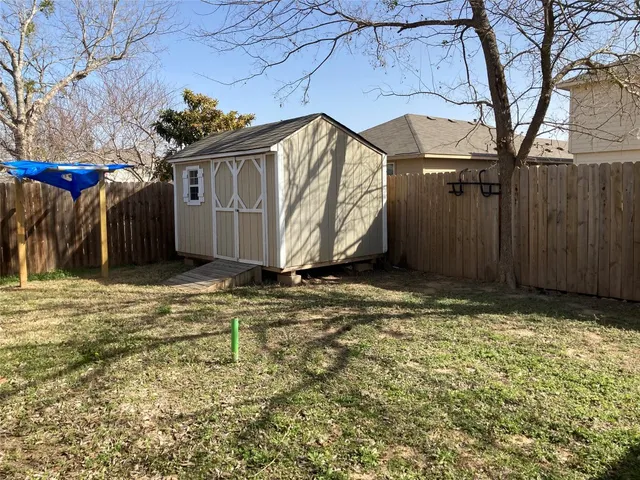 a view of a house with a snow in the yard
