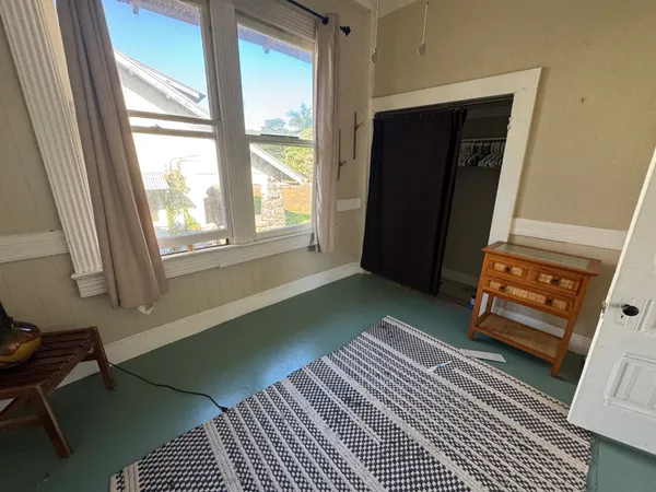 a room with windows and a table