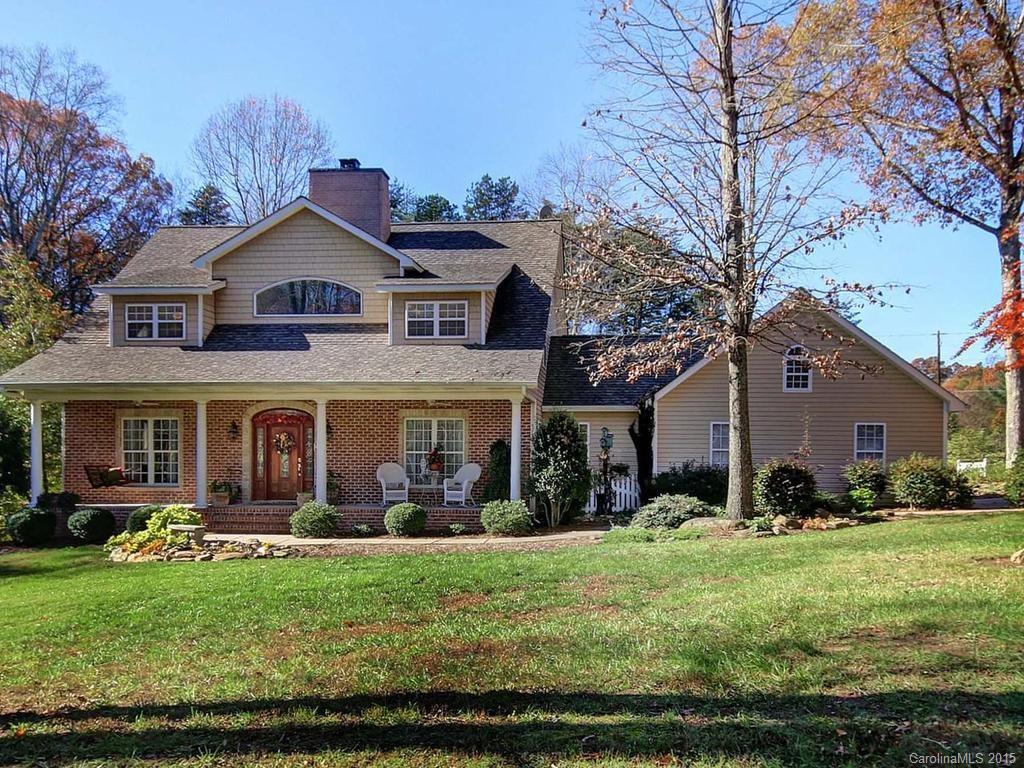 8729 Riverwood Road, Unit 53 Terrell, NC 28682 - Photo 1 of 24 a front view of house with yard and green space