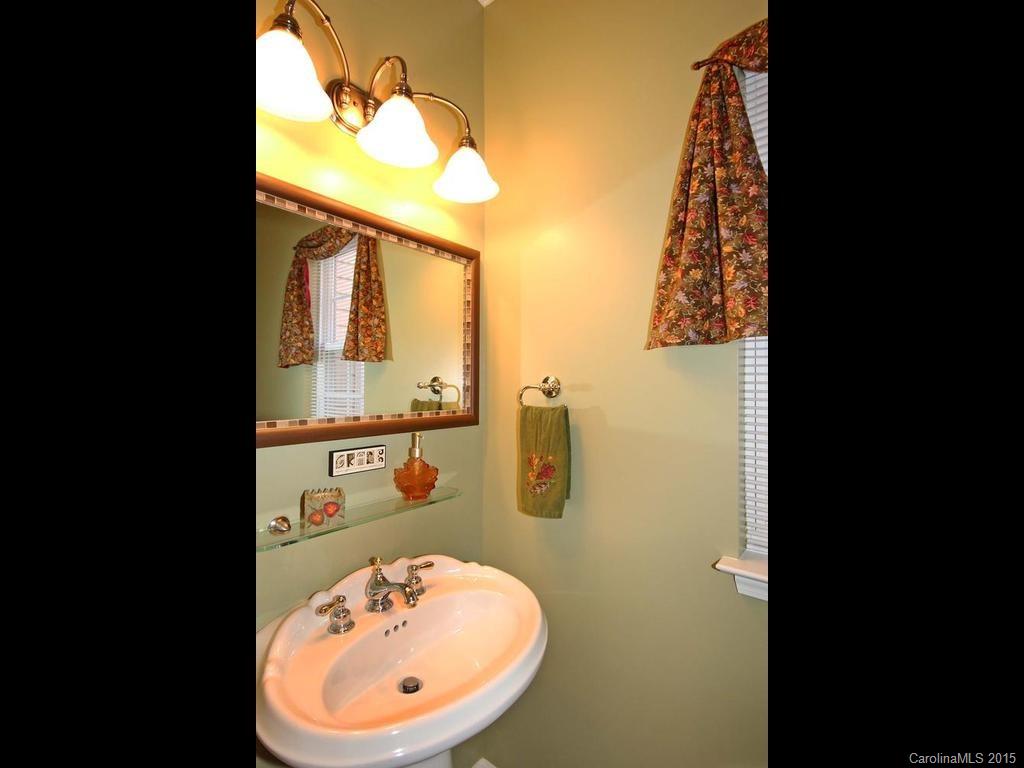 8729 Riverwood Road, Unit 53 Terrell, NC 28682 - Photo 14 of 24 view of a bathroom with a sink and mirror