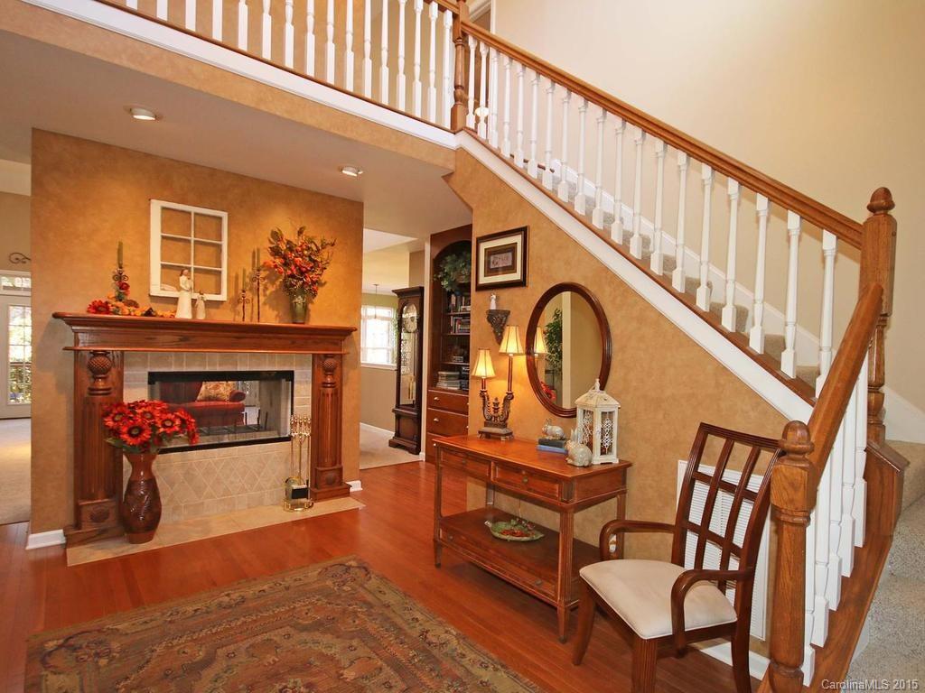 8729 Riverwood Road, Unit 53 Terrell, NC 28682 - Photo 3 of 24 a view of a couches with wooden floor