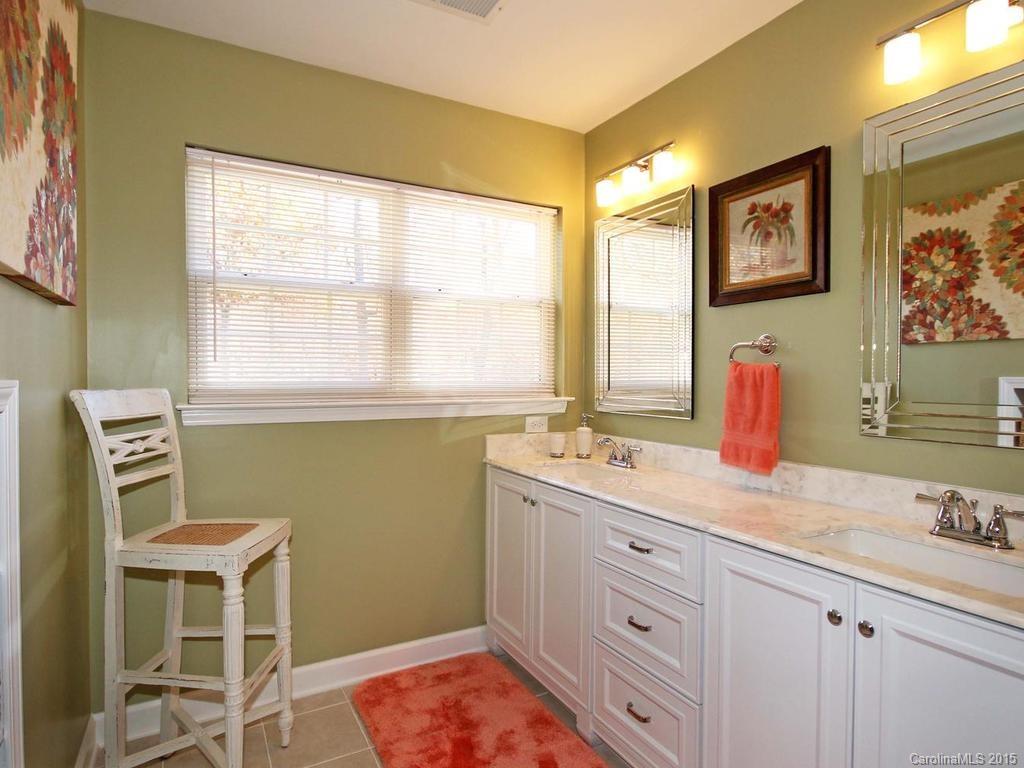 8729 Riverwood Road, Unit 53 Terrell, NC 28682 - Photo 21 of 24 a spacious bathroom with a double vanity sink and a window