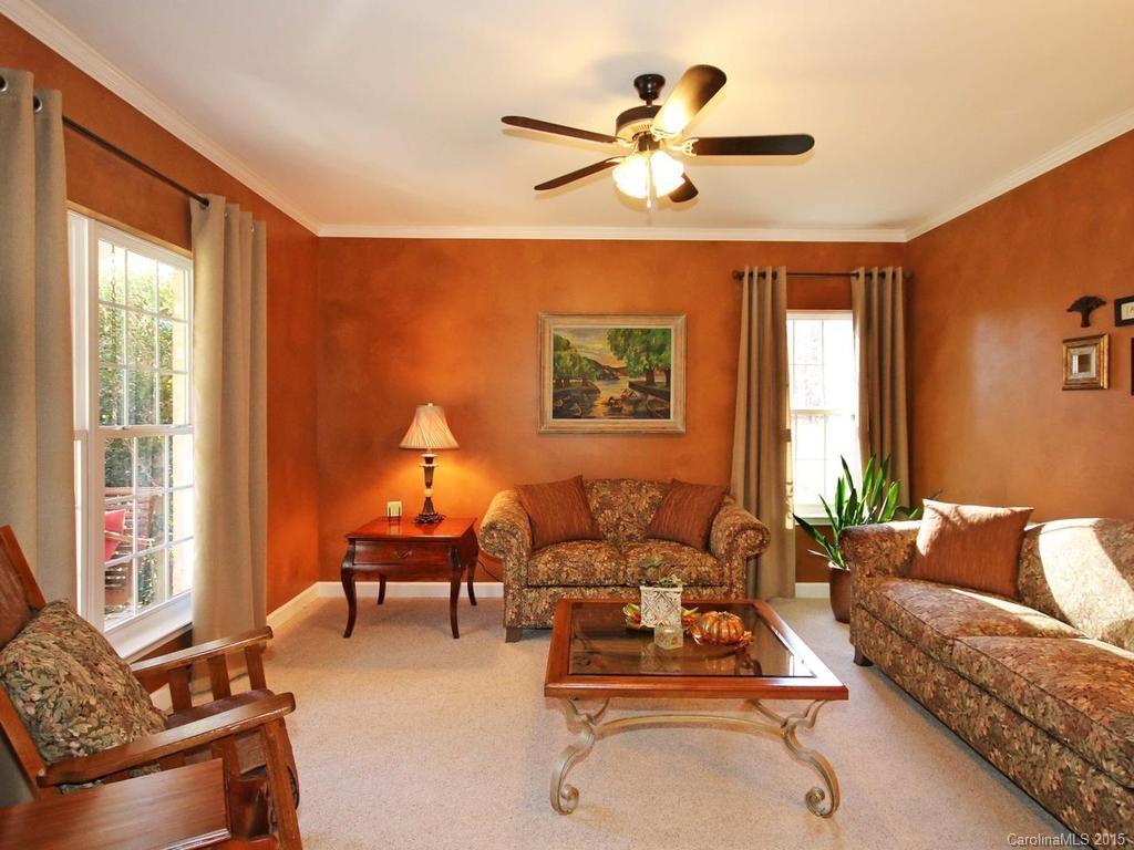8729 Riverwood Road, Unit 53 Terrell, NC 28682 - Photo 4 of 24 a living room with furniture and a large window