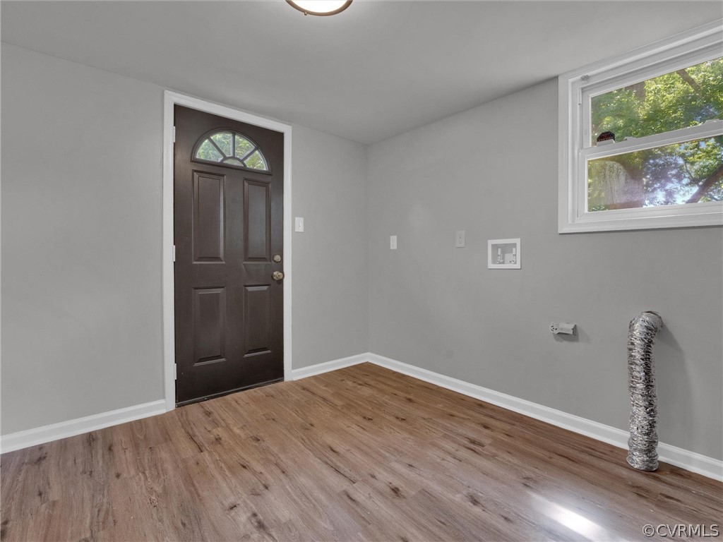731 Adkins Road Chesterfield, VA 23236 - Photo 13 of 37 wooden floor in an empty room with a window