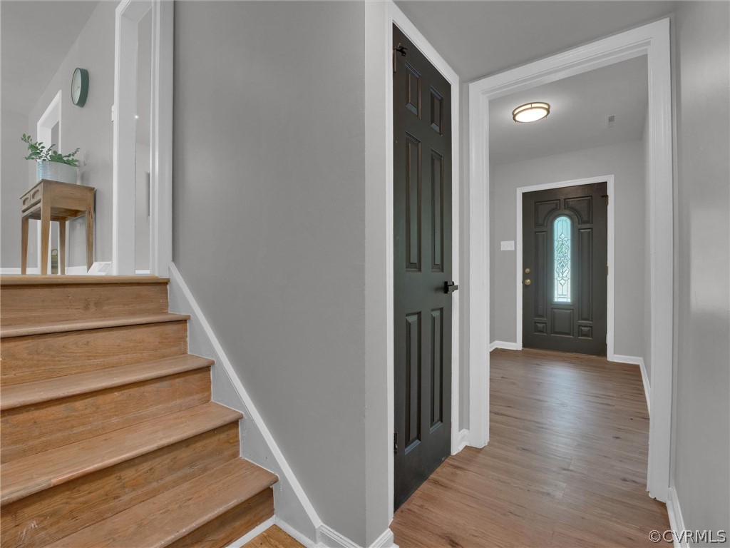 731 Adkins Road Chesterfield, VA 23236 - Photo 15 of 37 a view of a hallway with wooden floor and entryway